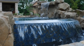 Gunite-vanishing-edge-pool-with-rico-rock-pebble-plaster