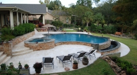 infinity-edge-gunite-pool-shellstone-pavers-cocktail-table-diamond-brite-plaster-multi-level-deck